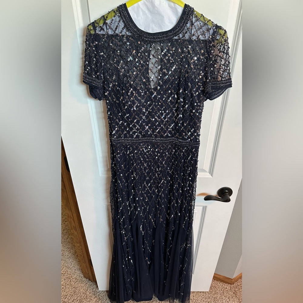 Navy blue formal sequin dress full length with a small mesh train